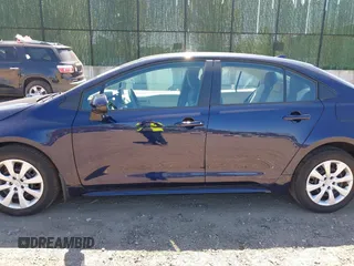 2022 Toyota Corolla LE with VIN 5YFEPMAE8NP320053, listed as a IAAI auction lot 42020183 with 6,673 mi miles and . Bid and sale history available at carsss.com. Image 14.