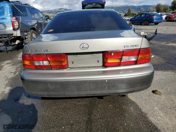 1998 Lexus ES 300 Luxury Sport Sdn with VIN JT8BF28G7W0142096, listed as a Copart auction lot 44586765 with 214,025 mi miles and Salvage Title. Bid and sale history available at carsss.com. Image 6.
