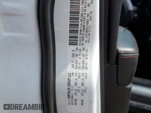 2014 Jeep Cherokee Trailhawk with VIN 1C4PJMBS9EW140344, listed as a Copart auction lot 50579005 with 117,326 mi miles and Salvage Title. Bid and sale history available at carsss.com. Image 13.