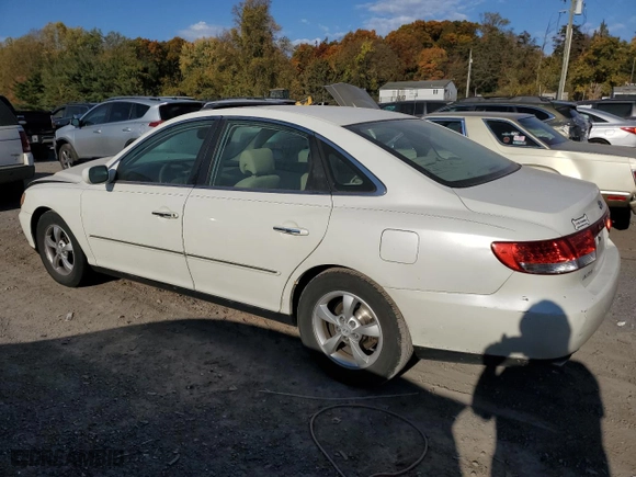2006 Hyundai Azera SE with VIN KMHFC46FX6A136882, listed as a Copart auction lot 77377864 with 165,124 mi miles and Salvage Title. Bid and sale history available at carsss.com. Image 2.