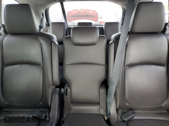 2018 Honda Odyssey EX-L z VIN 5FNRL6H7XJB031245, wystawiony jako Copart lot #59331635 z przebiegiem 74 901 mil mil oraz Czysty tytuł • Clean title. Historia ofert i sprzedaży dostępna na DreamBid. Obrazek 10.