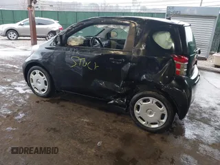 2013 Scion iQ with VIN JTNJJXB08DJ024825, listed as a IAAI auction lot 41842818 with 91,136 mi miles and . Bid and sale history available at DreamBid. Image 3.