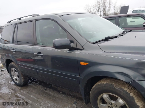 2006 Honda Pilot EX-L with RES with VIN 2HKYF18676H551683, listed as a IAAI auction lot 41501000 with 288,473 mi miles. Bid and sale history available at carsss.com. Image 13.