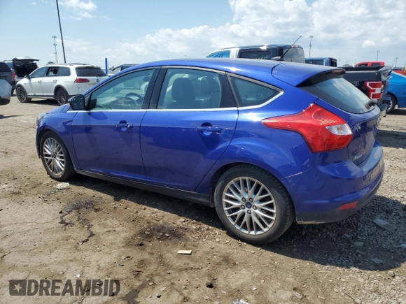 2014 Ford Focus Titanium with VIN 1FADP3N27EL284599, listed as a Copart auction lot 63400395 with 97,123 mi miles and Clean title. Bid and sale history available at DreamBid. Image 2.