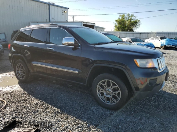 2013 Jeep Grand Cherokee Overland with VIN 1C4RJFCG2DC653207, listed as a Copart auction lot 48680885 with 276,020 mi miles and Salvage Title. Bid and sale history available at carsss.com. Image 4.