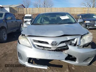 2012 Toyota Corolla L with VIN JTDBU4EEXC9170164, listed as a IAAI auction lot 41789075 with 206,239 mi miles and . Bid and sale history available at DreamBid. Image 12.