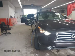 2016 Infiniti QX70 z VIN JN8CS1MW6GM752420, wystawiony jako IAAI lot #42509091 z przebiegiem 55 196 mil mil oraz . Historia ofert i sprzedaży dostępna na DreamBid. Obrazek 6.
