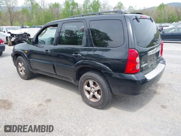 2005 Mazda Tribute S with VIN 4F2CZ96185KM16560, listed as a IAAI auction lot 42065748 with 84,584 mi miles and . Bid and sale history available at carsss.com. Image 3.