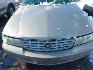 2001 Cadillac Seville Luxury SLS w/Monochrome Pkg with VIN 1G6KS54YX1U103892, listed as a IAAI auction lot 41550499 with 999,999 mi miles. Bid and sale history available at carsss.com. Image 6.