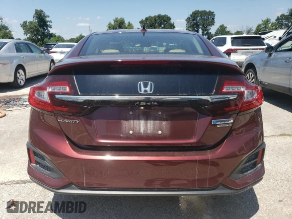 2018 Honda Clarity Touring with VIN JHMZC5F34JC006234, listed as a Copart auction lot 65652714 with 63,704 mi miles and Salvage Title. Bid and sale history available at DreamBid. Image 6.