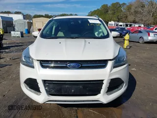 2014 Ford Escape Titanium with VIN 1FMCU9JX7EUD17335, listed as a IAAI auction lot 41302107 with 104,352 mi miles and . Bid and sale history available at DreamBid. Image 11.