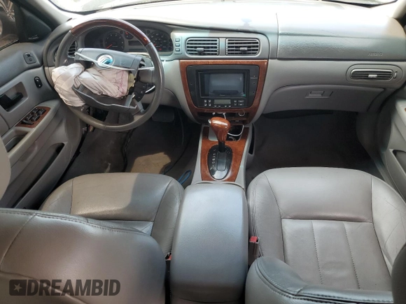2005 Mercury Sable LS z VIN 1MEFM55S75A619345, wystawiony jako Copart lot #55858325 z przebiegiem Nie podano mil oraz Szkoda całkowita • Salvage title. Historia ofert i sprzedaży dostępna na DreamBid. Obrazek 8.