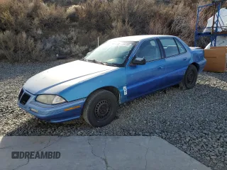 1995 Pontiac Grand Am z VIN 1G2NE55M9SM526000, wystawiony jako Copart lot #46363305 z przebiegiem 467 009 mil mil oraz Szkoda całkowita • Salvage title. Historia ofert i sprzedaży dostępna na DreamBid. Obrazek 1.