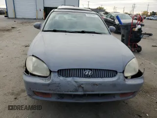2001 Hyundai Sonata GLS with VIN KMHWF35VX1A372516, listed as a Copart auction lot 76357494 with 170,642 mi miles and Salvage Title. Bid and sale history available at carsss.com. Image 5.