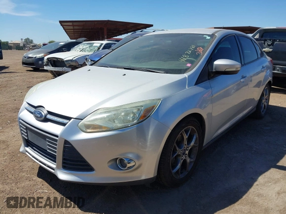2014 Ford Focus SE with VIN 1FADP3F25EL199002, listed as a IAAI auction lot 41872781 with 150,548 mi miles. Bid and sale history available at carsss.com. Image 2.