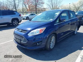 2016 Ford C-Max Energi SEL with VIN 1FADP5CU9GL102758, listed as a IAAI auction lot 41989630 with 103,410 mi miles. Bid and sale history available at carsss.com. Image 2.