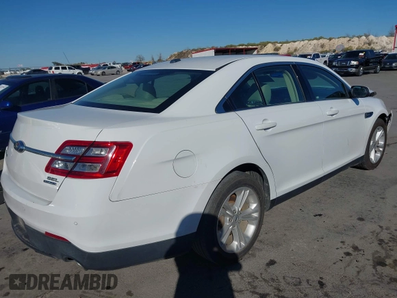 2015 Ford Taurus SEL with VIN 1FAHP2E8XFG182899, listed as a IAAI auction lot 41209454 with 93,477 mi miles and . Bid and sale history available at carsss.com. Image 4.