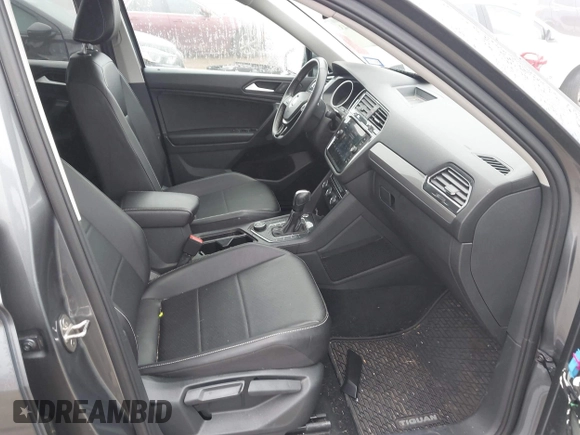 2021 Volkswagen Tiguan SE with VIN 3VV2B7AX8MM143189, listed as a IAAI auction lot 41646843 with 56,672 mi miles and . Bid and sale history available at DreamBid. Image 5.