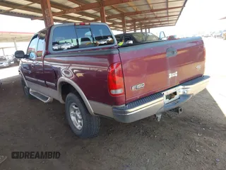 1998 Ford F-150 with VIN 1FTZX18WXWNC06973, listed as a IAAI auction lot 42442733 with 196,754 mi miles and . Bid and sale history available at DreamBid. Image 3.
