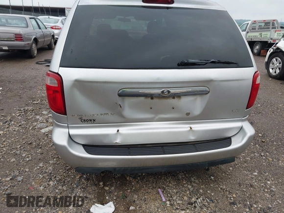 2005 Chrysler Town & Country LX with VIN 2C4GP44R35R152152, listed as a IAAI auction lot 42190551 with 128,239 mi miles and . Bid and sale history available at DreamBid. Image 6.