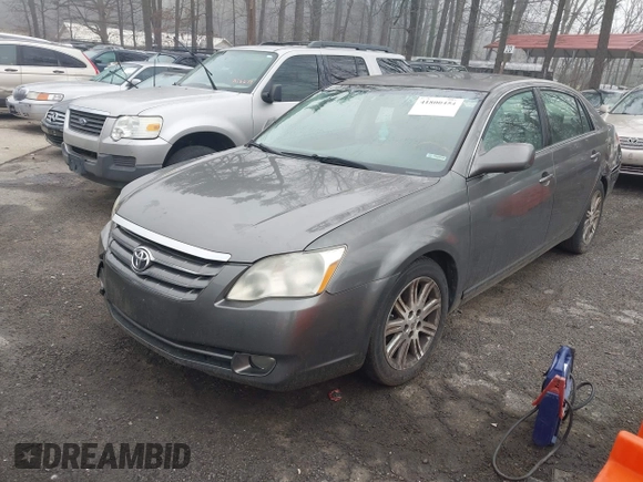 2007 Toyota Avalon XL with VIN 4T1BK36B47U171569, listed as a IAAI auction lot 41800454 with 237,627 mi miles. Bid and sale history available at carsss.com. Image 2.