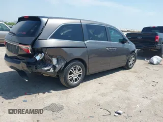 2012 Honda Odyssey EX with VIN 5FNRL5H41CB011940, listed as a IAAI auction lot 42033966 with 182,996 mi miles and . Bid and sale history available at DreamBid. Image 4.