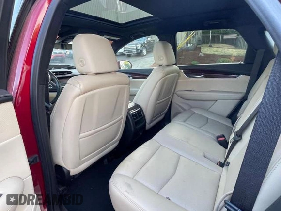 2019 Cadillac XT5 Premium Luxury AWD with VIN 1GYKNFRS2KZ251595, listed as a Copart auction lot 76847104 with 23,925 mi miles and Salvage title. Bid and sale history available at DreamBid. Image 6.
