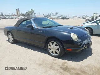 2002 Ford Thunderbird Hardtop Premium z VIN 1FAHP60A52Y128920, wystawiony jako IAAI lot #42549308 z przebiegiem 147 338 mil mil oraz . Historia ofert i sprzedaży dostępna na DreamBid. Obrazek 1.