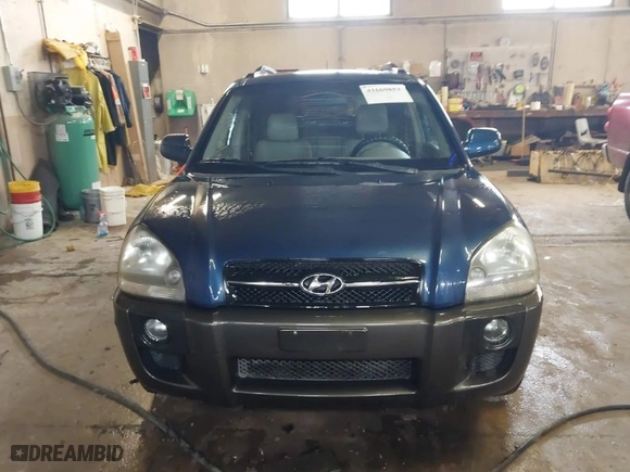 2005 Hyundai Tucson GLS with VIN KM8JN72DX5U076853, listed as a IAAI auction lot 41669853 with 164,241 mi miles. Bid and sale history available at carsss.com. Image 6.