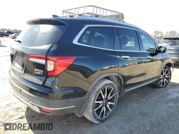 2019 Honda Pilot Touring 7-Passenger z VIN 5FNYF5H69KB019903, wystawiony jako Copart lot #43598805 z przebiegiem 144 486 mil mil oraz Szkoda całkowita • Salvage title. Historia ofert i sprzedaży dostępna na DreamBid. Obrazek 3.