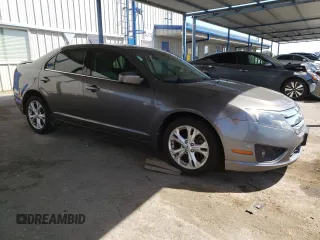 2012 Ford Fusion SE z VIN 3FAHP0HAXCR231865, wystawiony jako Copart lot #52644815 z przebiegiem 153 058 mil mil oraz Szkoda całkowita • Salvage title. Historia ofert i sprzedaży dostępna na DreamBid. Obrazek 4.