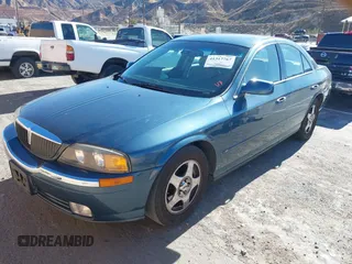 2001 Lincoln LS w/Base Pkg with VIN 1LNHM87A31Y617332, listed as a IAAI auction lot 41317767 with 141,931 mi miles. Bid and sale history available at carsss.com. Image 17.