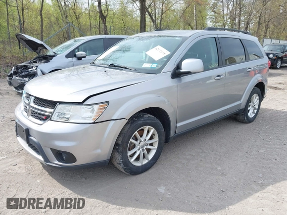2015 Dodge Journey SXT with VIN 3C4PDDBG4FT554643, listed as a IAAI auction lot 42172378 with 144,924 mi miles and . Bid and sale history available at DreamBid. Image 2.