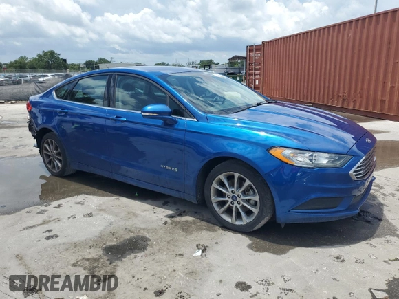 2017 Ford Fusion Hybrid SE z VIN 3FA6P0LU6HR319103, wystawiony jako Copart lot #58494695 z przebiegiem 104 483 mil mil oraz Szkoda całkowita • Salvage title. Historia ofert i sprzedaży dostępna na DreamBid. Obrazek 4.