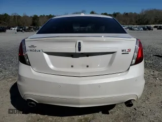2011 Lincoln MKS EcoBoost with VIN 1LNHL9FT7BG611097, listed as a Copart auction lot 48180885 with 140,262 mi miles and Salvage title. Bid and sale history available at DreamBid. Image 6.