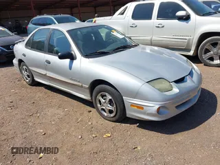 2002 Pontiac Sunfire SE z VIN 1G2JB524827441658, wystawiony jako IAAI lot #42036799 z przebiegiem 186 837 mil mil oraz . Historia ofert i sprzedaży dostępna na DreamBid. Obrazek 1.