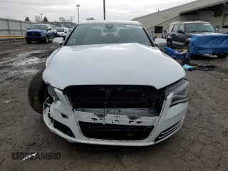 2012 Audi A8 с VIN WAUAVAFD0CN036751, выставлен на аукционе Copart как лот 86383784 с пробегом 96 658 миль миль и Списание • Salvage title. История ставок и продаж доступна на DreamBid. Изображение 5.