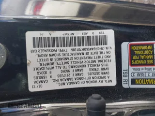 2013 Honda Civic Si with VIN 2HGFG4A56DH701586, listed as a IAAI auction lot 42187694 with 133,936 mi miles and . Bid and sale history available at DreamBid. Image 9.