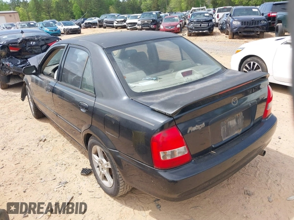 2003 Mazda Protege DX with VIN JM1BJ225630146692, listed as a IAAI auction lot 42017013 with 239,687 mi miles and . Bid and sale history available at DreamBid. Image 3.