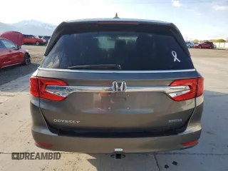 2018 Honda Odyssey Touring с VIN 5FNRL6H8XJB076145, выставлен на аукционе Copart как лот 51870865 с пробегом 96 486 миль миль и Списание • Salvage title. История ставок и продаж доступна на DreamBid. Изображение 6.