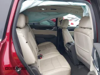 2020 Cadillac XT6 FWD Premium Luxury with VIN 1GYKPCRSXLZ133207, listed as a IAAI auction lot 41733269 with 82,853 mi miles and . Bid and sale history available at DreamBid. Image 8.