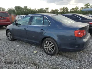 2005 Volkswagen Jetta 2.5L with VIN 3VWDG71K65M606300, listed as a Copart auction lot 57848515 with 108,928 mi miles and Salvage title. Bid and sale history available at DreamBid. Image 2.