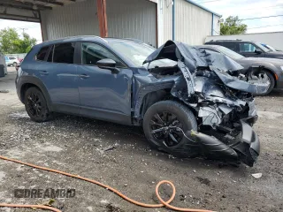 2023 Mazda CX-50 S Preferred Plus z VIN 7MMVABCM7PN103829, wystawiony jako Copart lot #56235495 z przebiegiem 42 473 mil mil oraz Nie do naprawy • Non repairable. Historia ofert i sprzedaży dostępna na DreamBid. Obrazek 4.