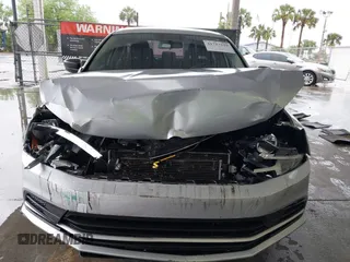 2016 Volkswagen Jetta Sedan 1.4T SE with VIN 3VWD67AJ2GM252658, listed as a IAAI auction lot 41757319 with 147,483 mi miles. Bid and sale history available at carsss.com. Image 12.