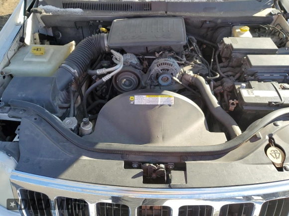 2009 Jeep Grand Cherokee Limited with VIN 1J8GR58K99C547604, listed as a Copart auction lot 88304075 with 209,833 mi miles and Salvage title. Bid and sale history available at DreamBid. Image 12.