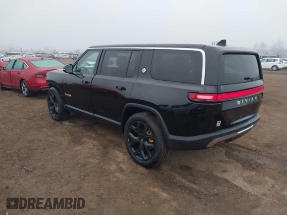 2024 Rivian R1S Adventure with VIN 7PDSGABA1RN035557, listed as a IAAI auction lot 41170478 with 5,210 mi miles. Bid and sale history available at carsss.com. Image 3.