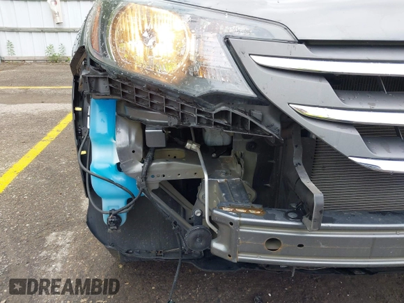 2013 Honda CR-V EX z VIN 2HKRM4H58DH656443, wystawiony jako IAAI lot #42348940 z przebiegiem 79 477 mil mil oraz . Historia ofert i sprzedaży dostępna na DreamBid. Obrazek 19.