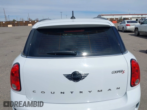 2016 MINI Countryman S with VIN WMWZC5C57GWU22015, listed as a IAAI auction lot 41806547 with 65,124 mi miles and . Bid and sale history available at DreamBid. Image 17.