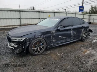 2022 BMW 5 Series M550i xDrive z VIN WBA13BK02NCH95983, wystawiony jako Copart lot #84501474 z przebiegiem Nie podano mil oraz Szkoda całkowita • Salvage title. Historia ofert i sprzedaży dostępna na DreamBid. Obrazek 1.