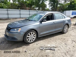 2014 Volkswagen Jetta SE with VIN 3VWD17AJ0EM246952, listed as a Copart auction lot 57507645 with 127,764 mi miles and Clean title. Bid and sale history available at DreamBid. Image 1.